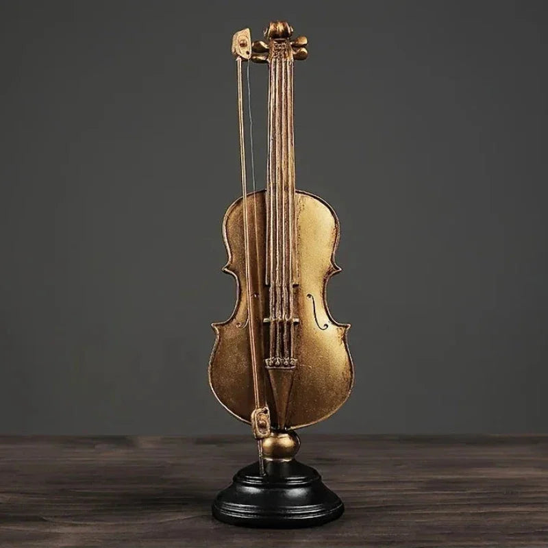 Ornamento Decorativo de Resina Violino e Saxofone Dourado Lenogue